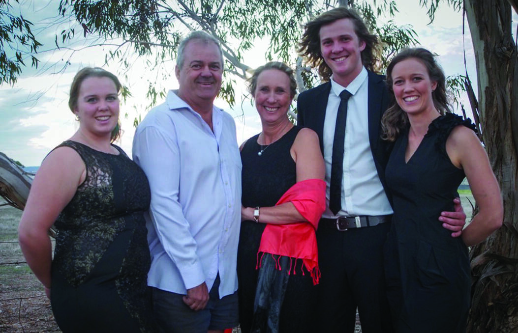  John and Michelle Hassell (middle) with their three children (L-R) Chelsea, George and Eliza.