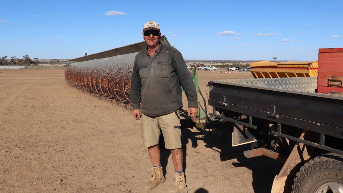 Mindarabin farmer Scott Hemley with the old hay rake he picked up for $8200 at the Elders clearing sale last week on behalf of EDL Farms Lake Magenta, Newdegate.