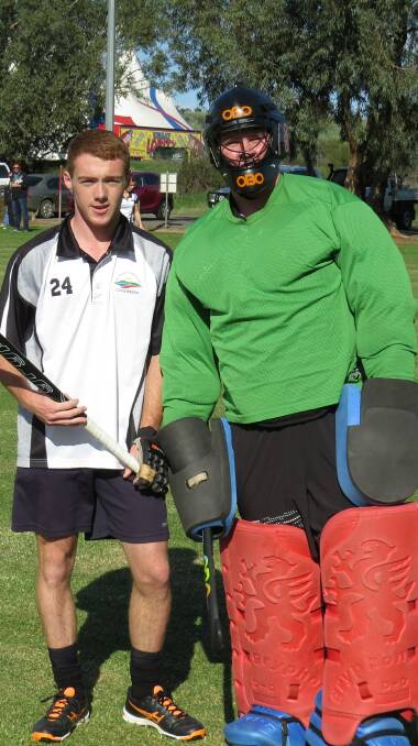 Hockey: Players Jordan Booth and Owen Wigg just before their game on Saturday morning. They both play for Cunderdin in the Avon Association.