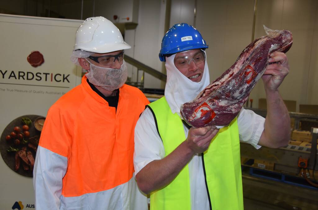 Toowoomba's Stacy Moxham, head chef at the Burke and Wills, examines Yardstick product at Beef City with boning room supervisor Jason Wippell.