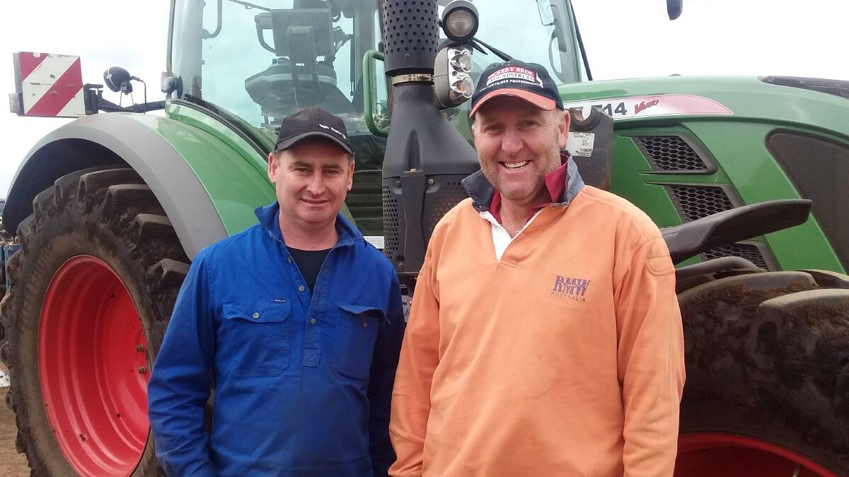 Hamilton district farmer Chris Cameron with Greg Halcom. Mr Cameron is planting corn on a peat swamp this year.