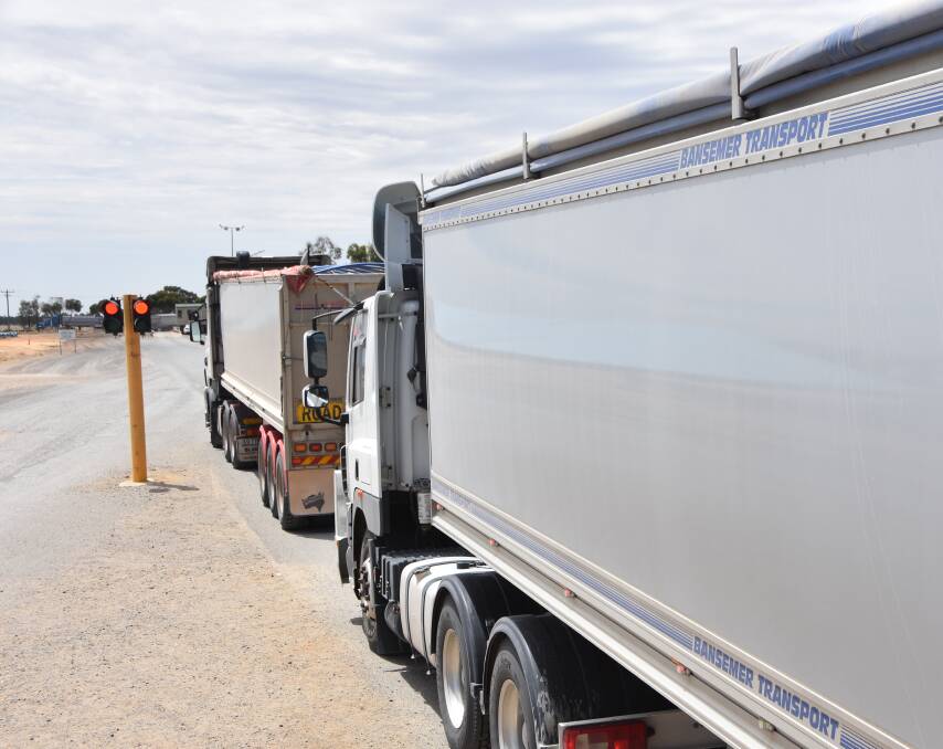 It has been a tough slog for growers getting their grain into the bulk handling system, with a degraded road network a key problem. Photo: Gregor Heard.