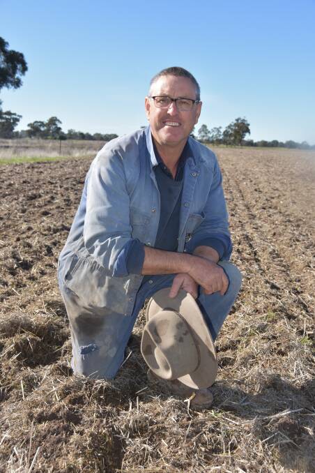 Michael Sudholz, who farms at Natimuk, west of Horsham, in a recently sown and sprayed paddock of Spartacus barley.