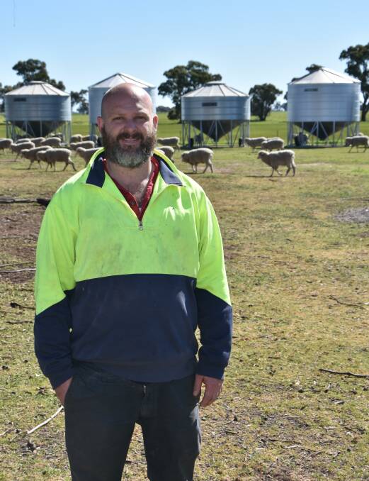 Wimmera farmer Sam Eagle in one of the containment areas which play a crucial role in managing livestock in his family farming enterprise.