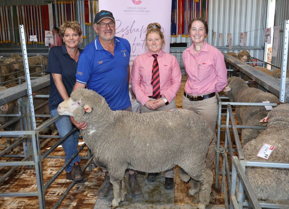 Belka Valley stud co-principal Robyn Jones, Cardiff Merino stud principal, Quentin Davies, Yorkrakine, Elders territory sales manager Merredin, Emma Dougall and Elders stud stock specialist, Lauren Rayner, with the $3000 top-priced ram purchased by Shane Jura, Jura Farms Pty Ltd, Bruce Rock. Proceeds from the sale of the ram have been donated to the Breast Cancer Research Centre WA as part of the Shearing for Liz Pink Day a joint initiative from Elders and Nutrien Ag Solutions.