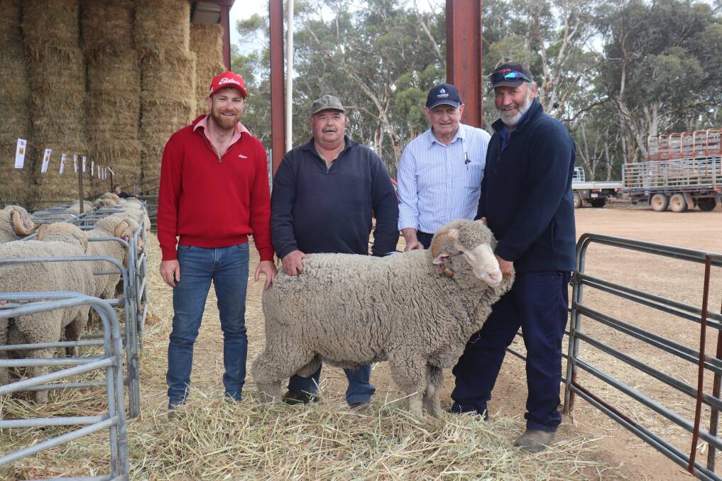 Elders Muchea representative Alan Barry (left), buyer John McTaggart, Glen Mervyn, Bruce Cameron, Kingsley and stud principal Roger Glover with the $5000 top-priced ram at the Mallibee on-property ram sale at Wannamal last week.