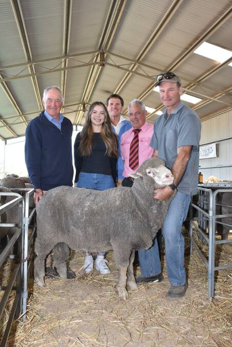 With the $3100 top-priced ram at Mondays Dongiemon and Tilba Tilba on-property ram sale at Williams, which was a Tilba Tilba Poll Merino, were Tilba Tilba co-principal Stuart Rintoul (left), Kate Edwards and her father Shane, Stockhill Grazing Co, Quairading, who purchased the ram, Elders auctioneer Preston Clarke and Tilba Tilba co-principal Andrew Rintoul.