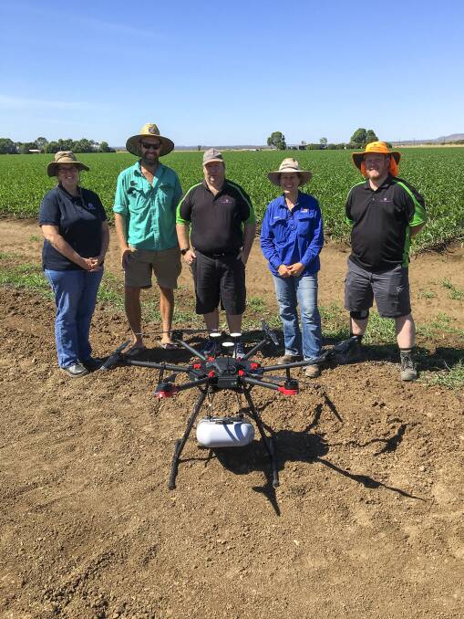 DPIRD senior research scientist Helen Spafford (left), grower Christian Bloecker, Stratus Imaging director and operations manager Andrew Dedman, ORDCO agronomist Penny Goldsmith and Stratus Imaging director and general manager Jonathan Smith check out a drone being used for fall armyworm crop surveillance.