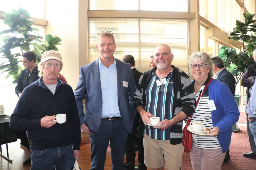Northcliffe dairy farmers Allan Walker (left) and Brian and Julie Armstrong (right), with Western Dairy vice-chairman and Busselton dairy farmer Robin Lammie.
