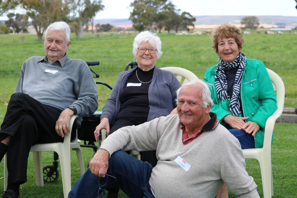 Relaxing in the sunshine were Kevin (left) and Shirley Kerr, Bullcreek, with Roy and Bobin Dunn, Shoalwater.