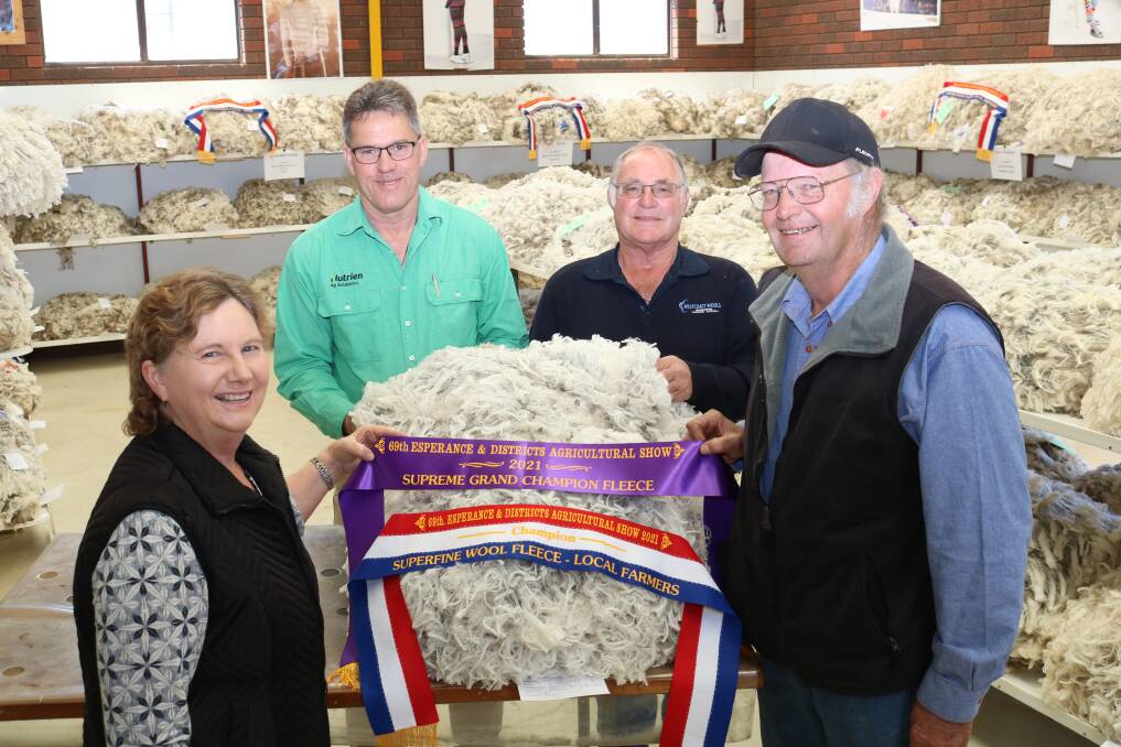 With the supreme grand champion and champion local farmers superfine fleece, were exhibitor Marion Mitchell (left), TH & MH Mitchell, Anthos, Esperance, head steward and Nutrien Ag Services region wool manager Andy Beaton, Esperance, judge Mike Smithson, Westcoast Wool & Livestock wool buyer, Esperance and exhibitor Terry Mitchell.