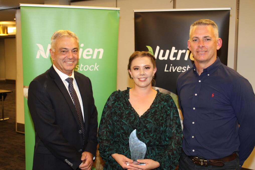 Nutrien Livestock administration team member Jessica Doyle was congratulated on her recognition award for her continued efforts at the Muchea Livestock Centre by Mr Giglia (left) and Mr Clayton.
