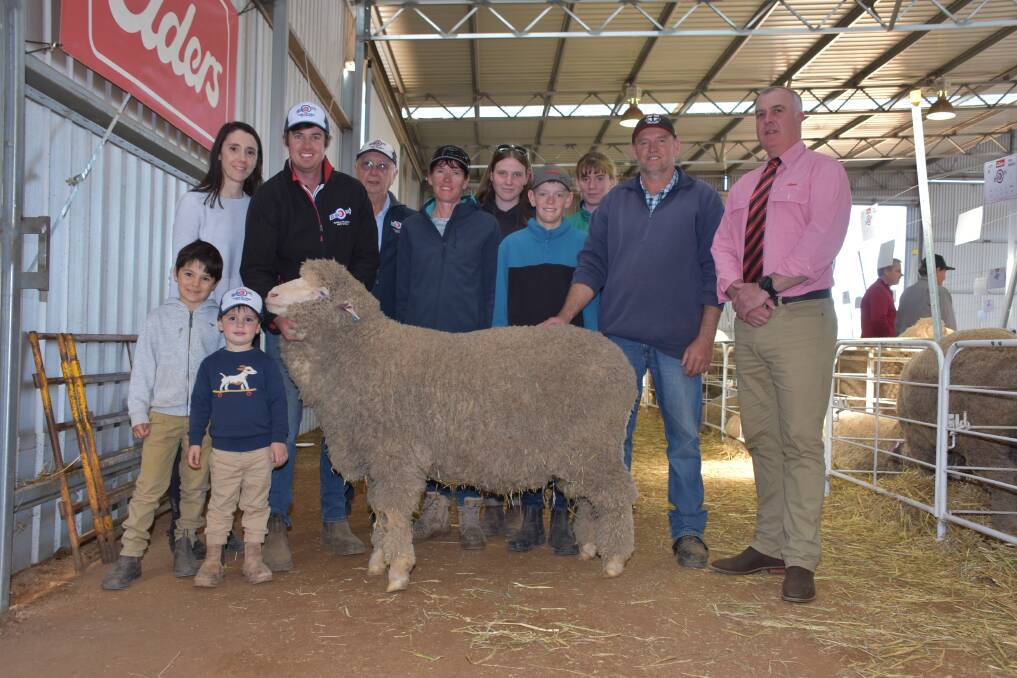 With the $9500 top-priced Poll Merino ram at the Kolindale on-property ram sale at Dudinin lasy Monday were Kolindale co-principals Daniela (left) Varone and Luke Ledwith with nephew Harry Hunter and son Louis, Kolindale connection Colin Lewis, buyers Linda, Zoe, Sean, Amy and Peter McCrea, Salmon Gums and Elders State general manager WA Nick Fazekas.