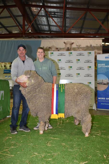 With the reserve grand champion Poll Merino ram and champion fine wool Poll Merino ram exhibited by the Eastville Park stud, Wickepin, were stud co-principals Grantly and Elise Mullan.
