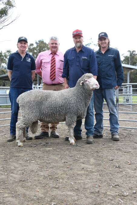 Prices hit a high of $10,750 for this ram at the Westerdale on-property Poll Merino ram sale at McAlinden last week when it sold to Rhodes Pastoral, Boyup Brook. With the ram were Westerdale stud principal Peter Jackson (left), Elders, Darkan agent Wayne Peake and Rhodes Pastoral's Phil Corker and Josh Marinoni.