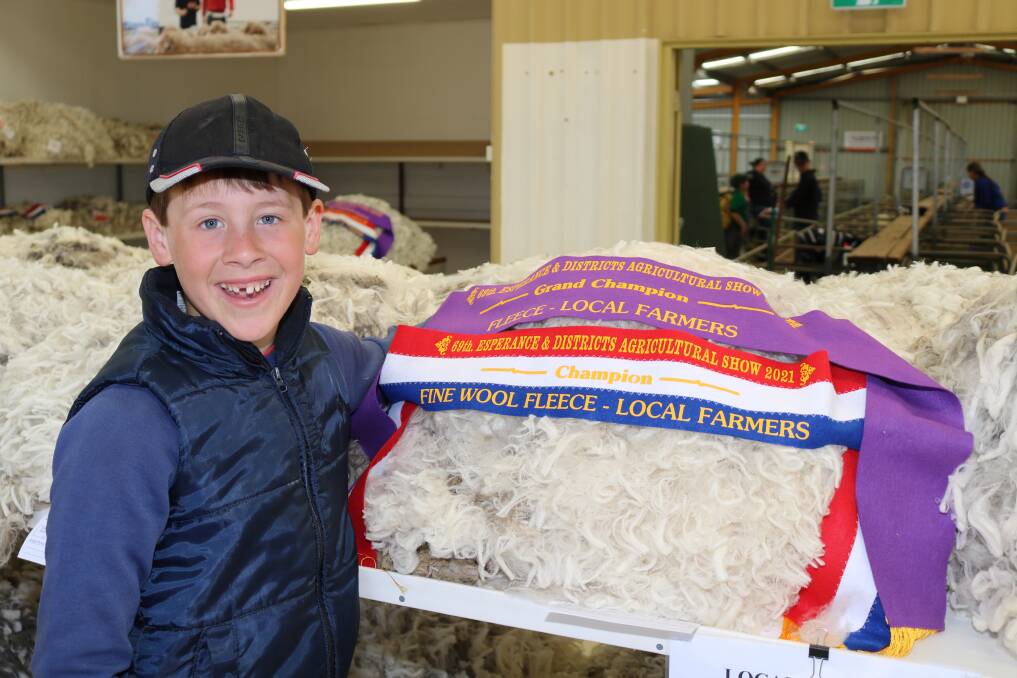 In his first time showing wool at Esperance show Lachlan Coward was thrilled to win champion local farmers fine wool fleece and grand champion local farmers fleece.