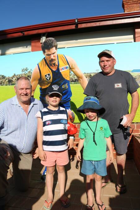 Brendan Beck (right) travelled from Goomalling with his niece and nephew Kaydee, 7, and Brodie, 4, Hayes who stopped to talk to Northampton AFL legend Andrew Lockyer.