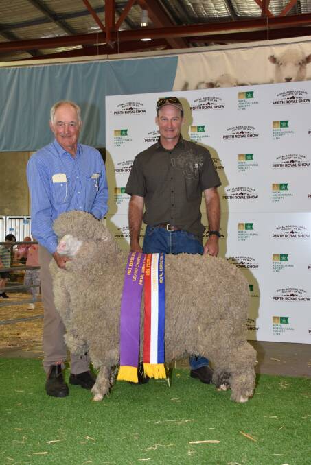 The Tilba Tilba stud, Williams, exhibited the grand champion Merino ewe. With the ewe which was also sashed the champion superfine Merino ewe were stud principals Stuart (left) and Andrew Rintoul.
