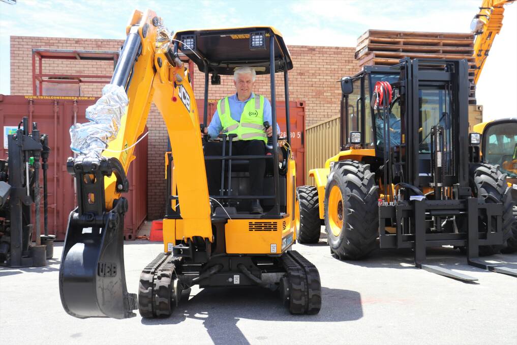 CEA WA general manager Renay van der Meulen at the controls of a near-silent, battery-electric JCB mini excavator.