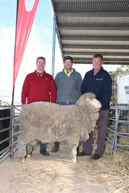 The top price for a Poll Merino ram at Mondays Angenup on-property ram sale was $4500. With the top price Poll ram were Elders auctioneer Nathan King (left), buyer Jarrad Beech, Rothbury stud, Tenterden and Angenup co-principal Paul Norrish.