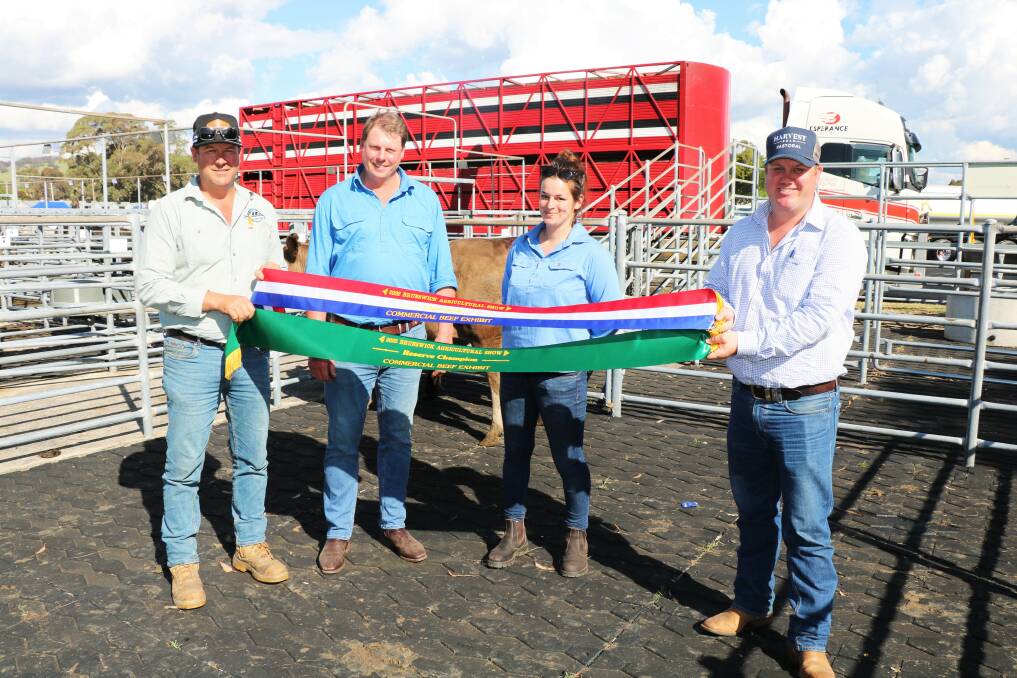 Displaying the championship ribbons were chief steward Rodney Galati (left) and buyer, Jono Green (right), Harvey Beef, with exhibitors, Daryl Avery and Charlotte Durin, WC, BE & DC Avery Scott River.