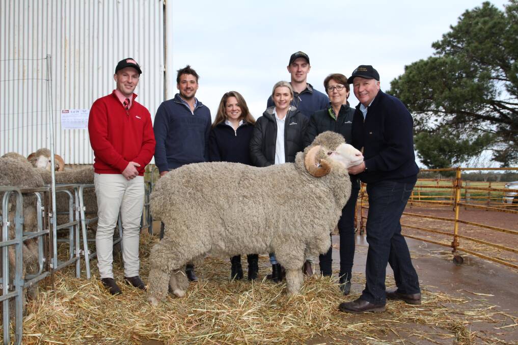 Elders auctioneer and Gnowangerup representative James Culleton (left) and Woodyarrup stud connections Lachlan Dewar, Minou Runkel, Isabella Dewar, Mitch Banks, Sandra Gianoli and Craig Dewar, Broomehill, with the March-shorn $11,250 second top-priced ram that was purchased by AWN Livestock manager Don Morgan for an Upper Great Southern client.