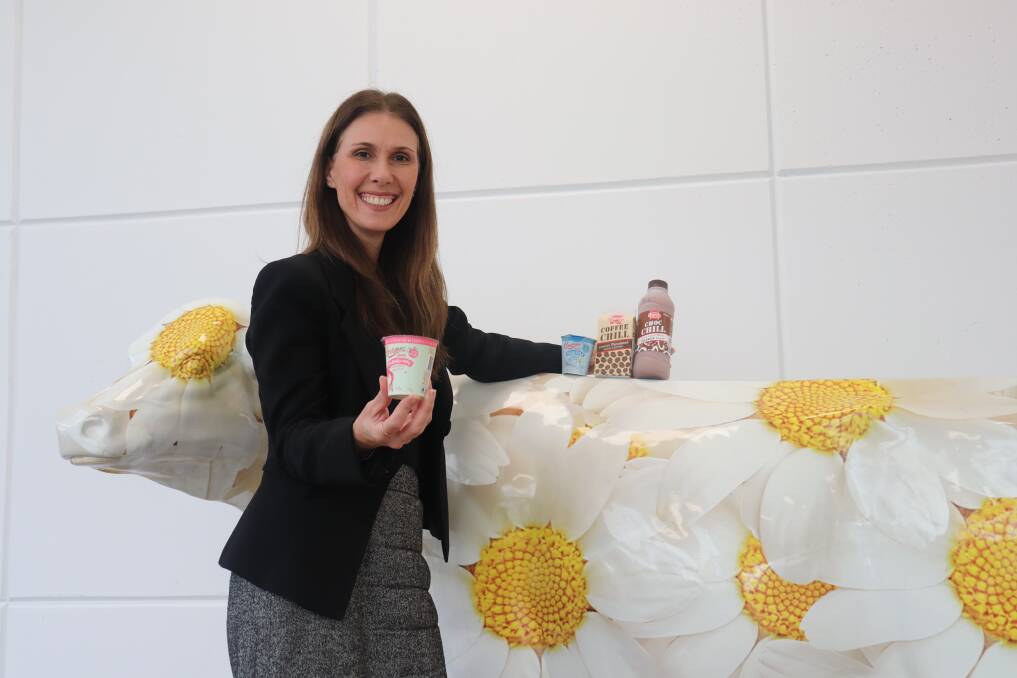 Brownes Dairy chief executive officer Natalie Sarich-Dayton with some of the products the company plans to export to Singapore and later Thailand and Malaysia, with the help of a State Government grant.