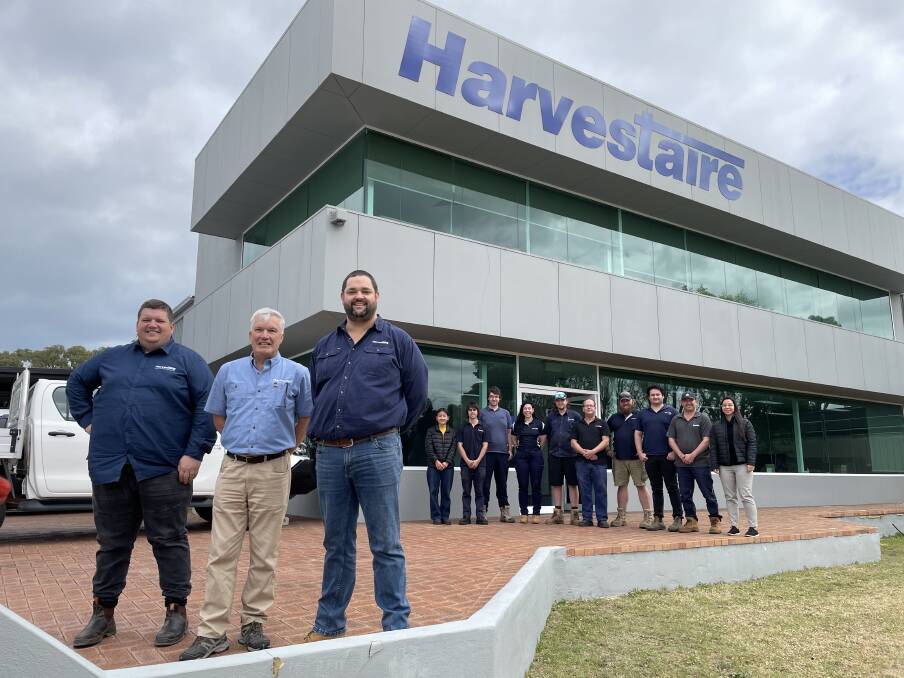 Harvestaire sales manager James Haggerty (left), dealer support officer Stewart Harrison and general manager Dirk Vorster with the rest of the staff outside the agricultural machinery parts suppliers new Balcatta headquarters.