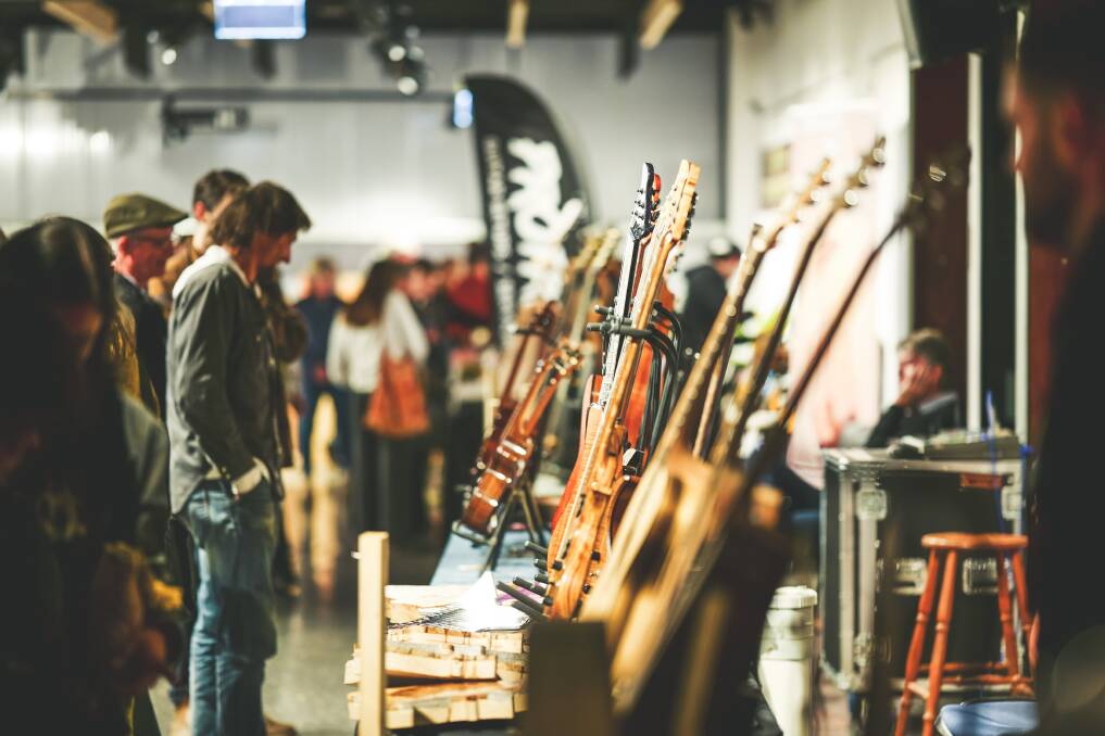 The trade show offers guitar-related wares from some of the worlds biggest manufacturers and smaller, local instrument makers. Photo by Isolated Photography.