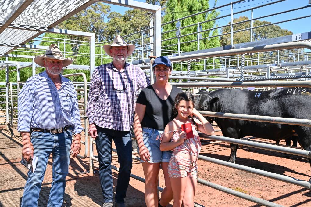 Volume buyers were Alcoa Farmlands, Pinjarra and Wagerup. Standing with one of the bulls it purchased were Alcoa Farmlands Richard Gardiner (left) and Vaughn Byrd with Gandy Angus stud connections Lex Gandy and her nine-year-old daughter Romy.