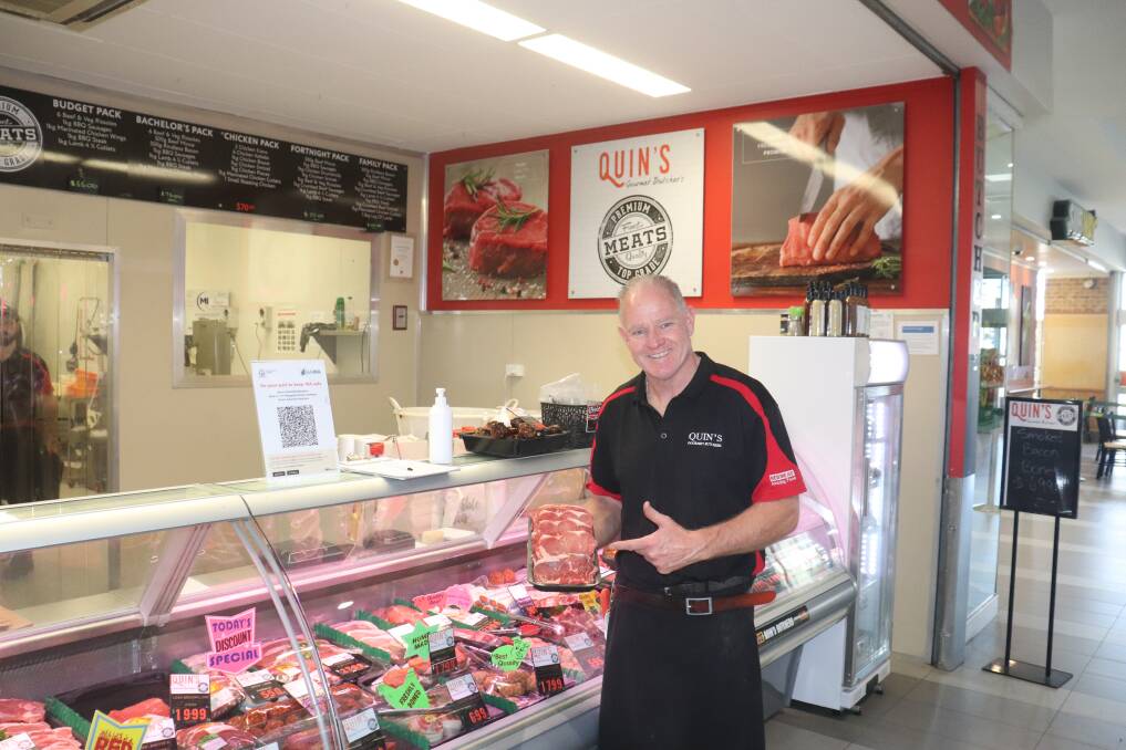 Andrew Quin showing some of the scotch fillets available at Quin's Gourmet Butchers, Northam.