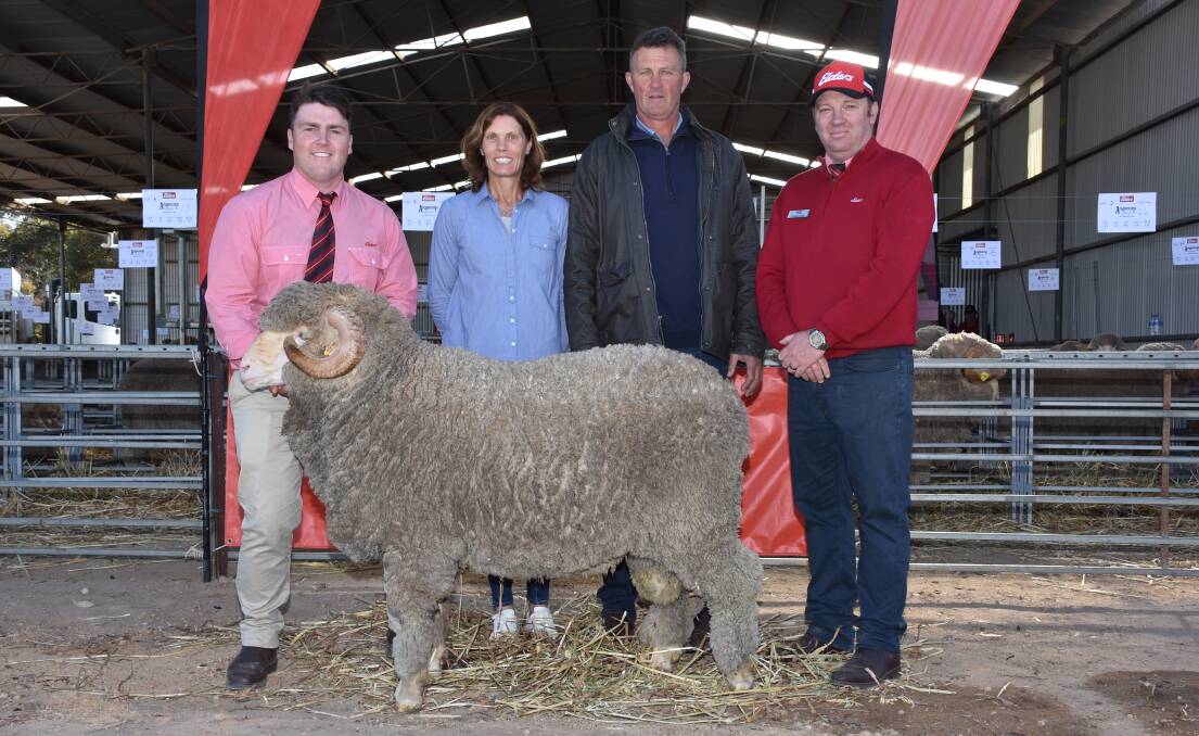 Prices hit a high of $5500 for this Merino ram at the Angenup on-property ram sale at Kojonup on Monday when it sold to Tom Marshall, TG Marshall, Cranbrook. With the ram were Elders Kojonup representative Liam Want (left), Angenup co-principals Trish and Gavin Norrish and Elders Kojonup branch manager Cameron Grace.