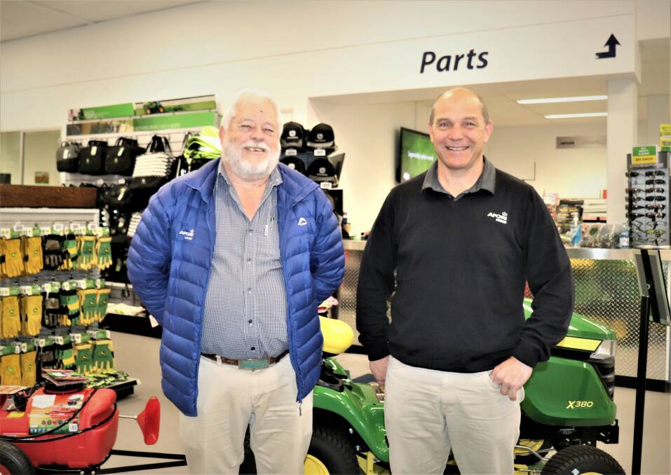 AFGRI Equipment Australia's operations director Gollie Coetzee (left) and commercial director Wessel Oosthuizen at the company's South Guilford headquarters. Economies of scale from the acquisition of Ag Implements will enable further investment in staff and training, they said.