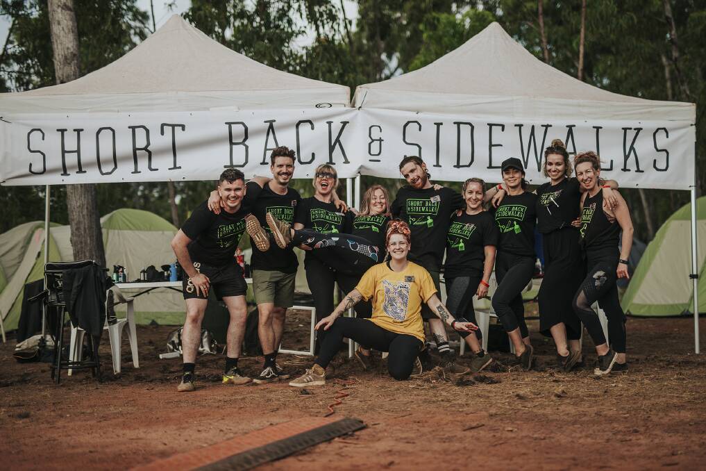 Craig Hollywood with some of the Short Back & Sidewalks volunteering team at the Garma Festival of Traditional Culture in North East Arnhem Land in the Northern Territory.
