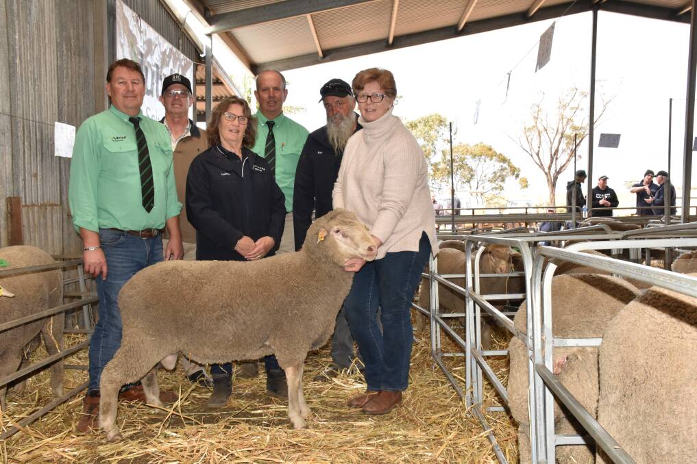 The $11,600 top-priced South African originated dual purpose breed ram for the 2022 ram selling season was sold by the Kintail Park Dohne stud, Jerramungup, at its final on-property ram sale in September. With the ram were Nutrien Livestock Breeding representative Roy Addis (left), buyer Darren Cameron, Hamilton Run stud, Goroke, Victoria, Kintail Park co-principal Colleen Parsons, local Nutrien Livestock representative Neil Foreman, Kintail Park co-principal Kim Parsons and buyer Fiona Cameron, Koonik stud, Goroke.