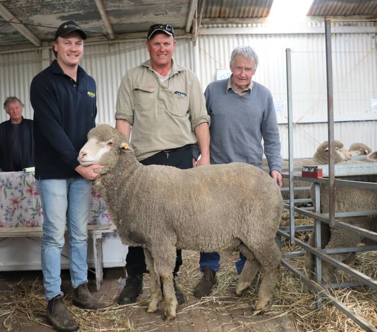 Sam Howie (left), Dyson Jones Wool Marketing Services, buyer Andrew Grieve, Fairholme Holdings, Cuballing and Fern Park Poll Merino stud principal Kevin Pauley with the $2200 second top-priced ram.