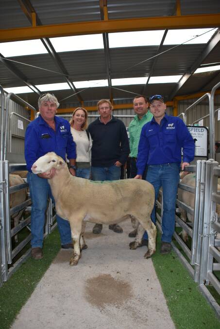 The Macsfield White Suffolk stud, Condingup and Beaumont, led the way in the prime lamb sire section of the sale selling this sire for $2700 to the Fowler family, Chilwell, Condingup. With the ram were Macsfield stud principal Neville McDonald (left), buyers Robyn and Simon Fowler, Nutrien Livestock, Esperance agent Darren Chatley and Matt McDonald, Macsfield stud.