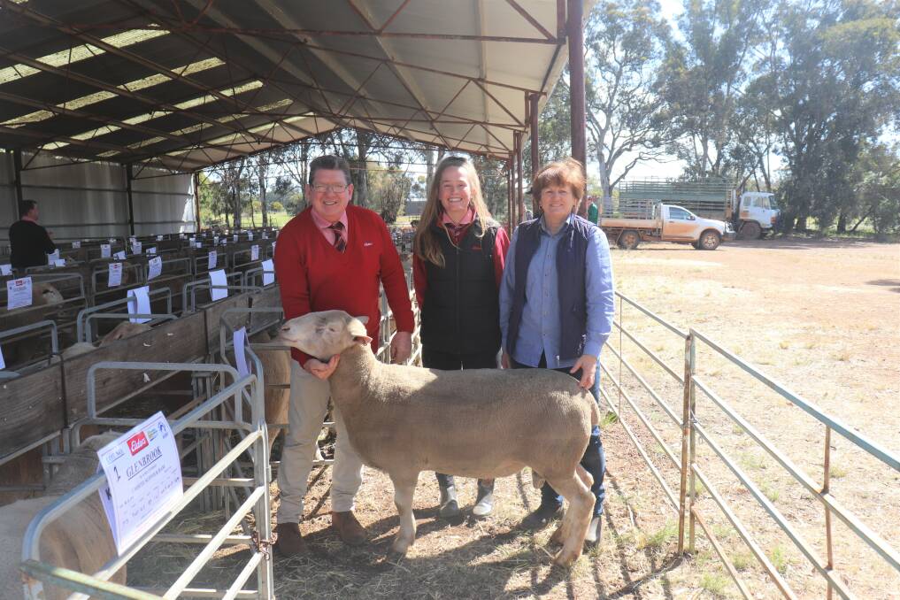 Elders prime lamb specialist Michael O'Neill (left), Elders livestock trainee Lauren Rayner and Glenbrook stud principal Roz Cuthbert, with the $2250 top-priced ram at last week's Glenbrook White Suffolk ram sale at Darkan. Mr O'Neill purchased the ram on behalf of Wandibirrup Grazing Co, Beaufort River.