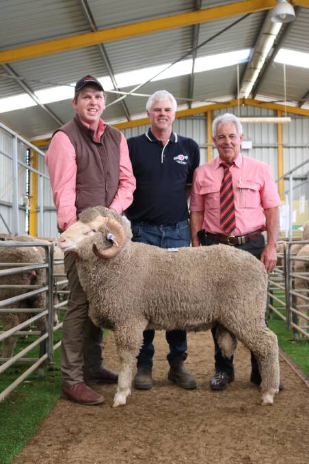 With the $3300 top-priced Kolindale ram bought by Phillips River Grazing Pty Ltd, Ravensthorpe, were Elders Esperance agent Callum O'Neill (left), who acted on behalf of the buyers, Kolindale co-principal Matthew Ledwith, Dudinin and Elders auctioneer Preston Clarke.