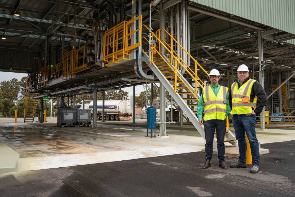 Nutrien Ag Solutions region manager - west, Andrew Duperouzel (left) and head of WA fertiliser operations Sam Hunt in front of the gantry at the new site.