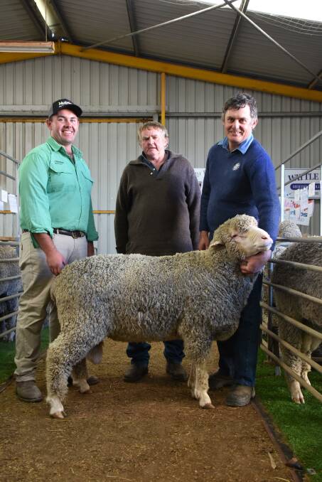 In the Penrose Poll Merino stud offering prices topped at $3900 for this sire. With the ram were Nutrien Livestock, Esperance representative Jake Hann (left), buyer Peter Piercey, D Piercey & Co, Salmon Gums and Penrose stud principal Bruce Pengilly, Cascade.