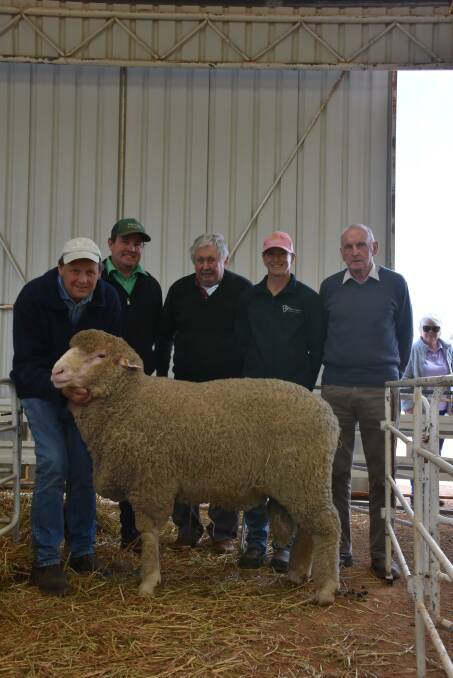 Prices hit a high of $11,000 at the Belmont Park on-property Poll Merino ram sale at Wagin earlier this month for this Poll Merino ram. With the ram were Belmont Park co-principal Raymond Edward (left), Nutrien Livestock Breeding representative Mitchell Crosby, Belmont Park co-principal Malcolm Edward, buyer Tahryn Trevenen, High Valley stud, Tarin Rock and Lachie Thornton, Narrogin, who helped Ms Trevenen in purchasing.