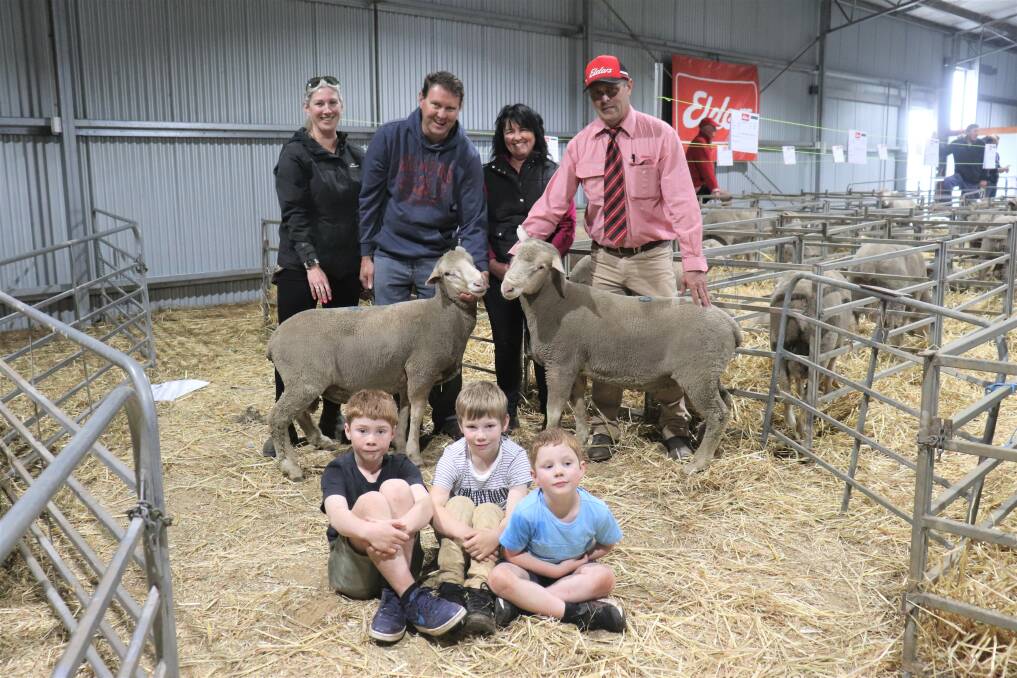 Buyers Clare King (left), Narrikup, Jarrod Thorn,Tambellup, Royston co-principal Sandy Forbes, Napier Elders, Mt Barker representative Dean Wallinger, with two of the three $2400 equal Prime SAMM top-priced rams at Monday's Royston on-property ram sale. With them were Henry, George and Theodore King.