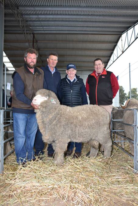 Prices hit a high of $20,000 for this Poll Merino ram at the Angenup on-property ram sale at Kojonup on Monday when it sold to the Moorundie stud, Keith, South Australia. With the ram were Angenup co-principals Paul (left) and Gavin Norrish, Angenup stud consultant Bruce Cameron, who purchased the ram for the Moorundie stud and Elders stud stock manager Tim Spicer.