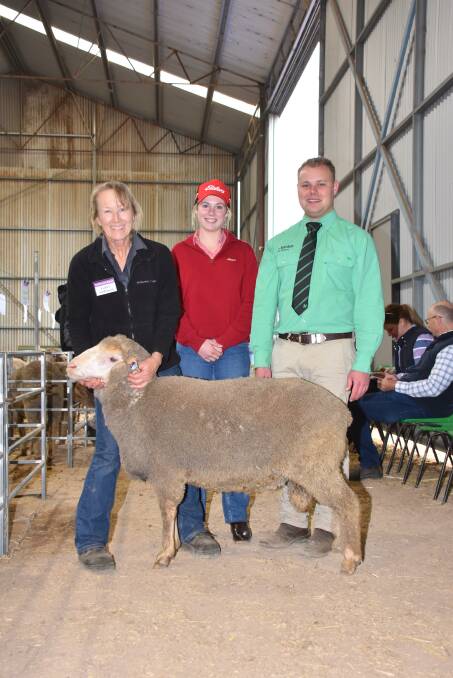 Prices hit a high of $26,000 at last week's Anderson Rams on-property Poll Merino ram sale at Kojonup when this ram sold to Oxton Park, Harden, New South Wales. With the ram were Anderson Rams principal Lynley Anderson (left), Elders, Kojonup wool and livestock representative Alex Prowse, who bid for Oxton Park and Nutrien Ag Solutions, Kojonup branch manager Stuart Richardson.