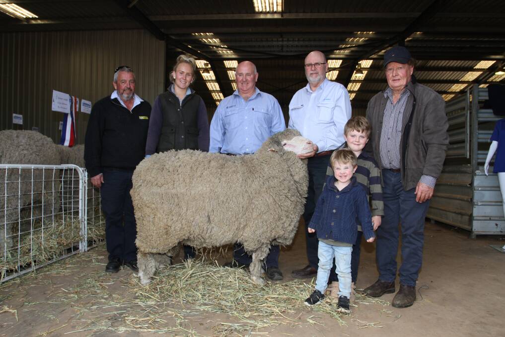 With the $9000 top-priced ram at the Lewisdale stud's 58th annual on-property ram sale at Wickepin last weekend was Andrew Kitto (left), Dyson Jones, Wickepin/Newdegate, buyers Olivia and Steve Fowler, Jumbuk Plains, Esperance, AWN auctioneer and livestock manager Don Morgan and Lewisdale stud principal Ray Lewis with his grandchildren Kai and Jordan Taylor.