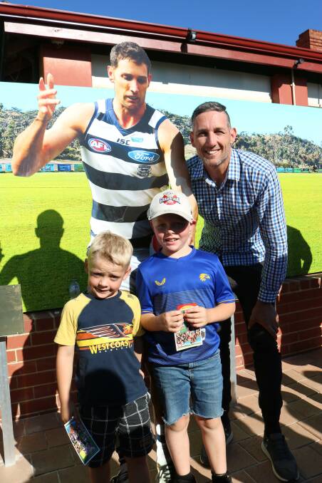 A signature from Geelong legend Harry Taylor made the day for Cooper (left), 6 and Chase, (8), Womersley, Geraldton.