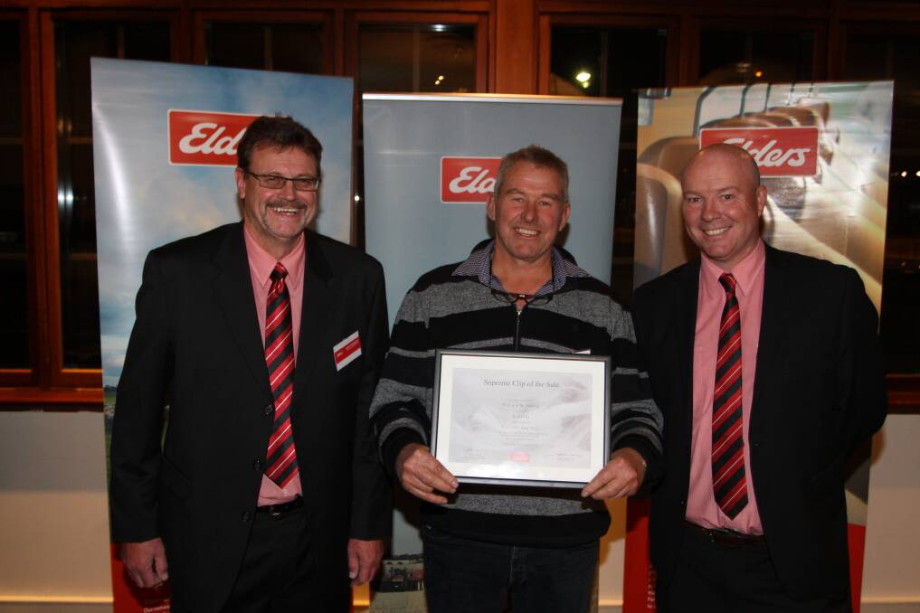 Richard House (centre), Barloo stud, Gnowangerup, was congratulated by Elders wool sales manager south Perry Roberts (left) and Elders district wool manager Travis King on winning the award for sale F51.