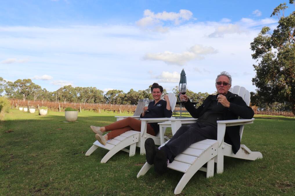 Father and daughter Greg and Danica Bettenay enjoying the view at their family-owned nougat and wine business, Bettenays in Margaret River.