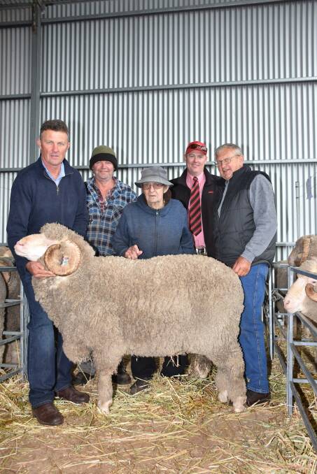 The top price for a Merino ram at Monday's Angenup on-property ram sale was $15,500 paid for this ram by TG Marshall, Cranbrook. With the ram were Angenup co-principal Gavin Norrish (left), buyers Jeff Pope and Tom Marshall, Elders south area manager Matt Ericsson and Angenup co-principal Rod Norrish.